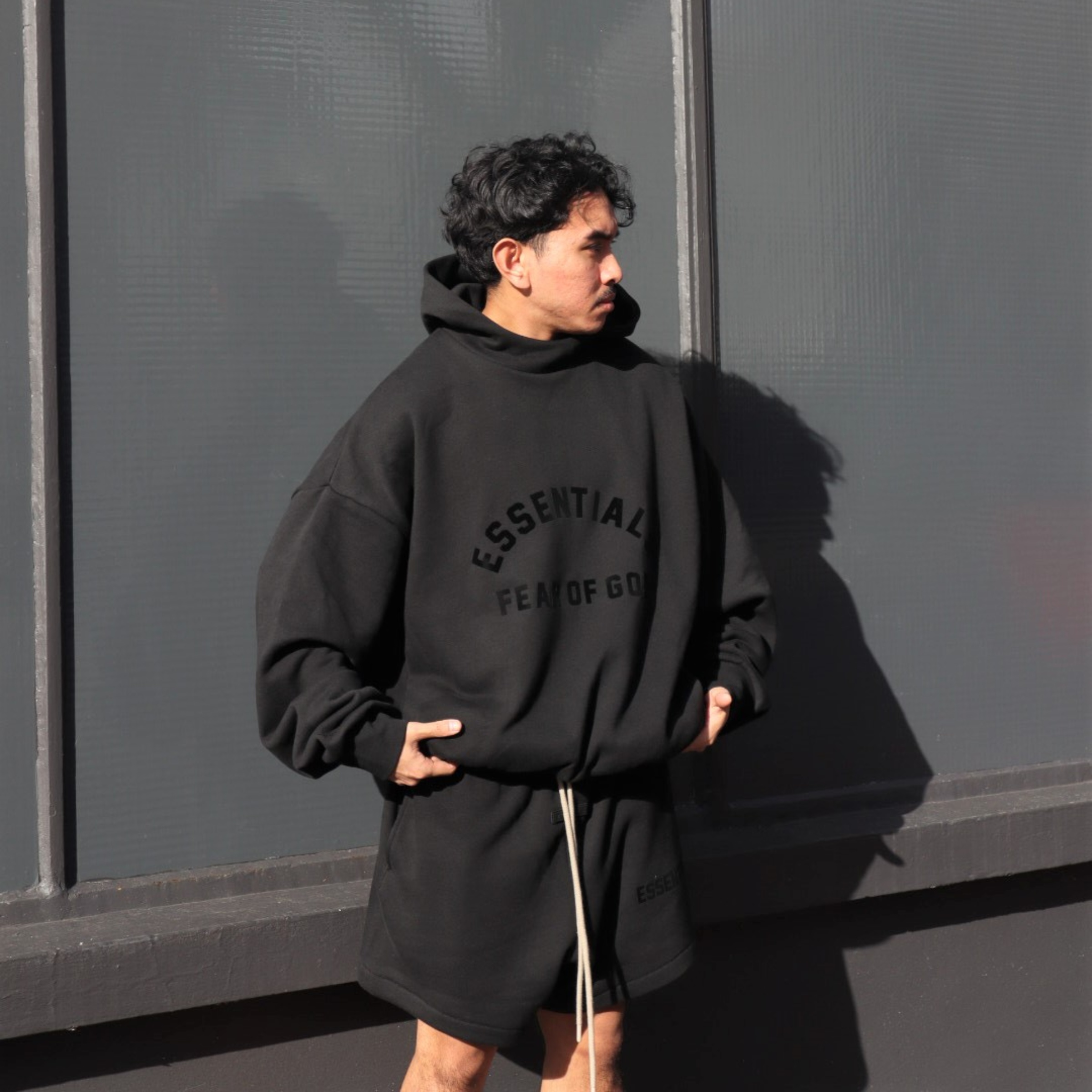 Redefining Athletic Attire with Essential Hoodie